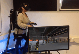 Multisensory Virtual Reality Simulation of Crowd Evacuation in Building Fire Scenarios
