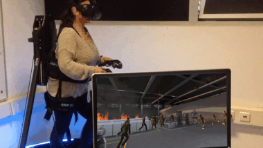 Multisensory Virtual Reality Simulation of Crowd Evacuation in Building Fire Scenarios